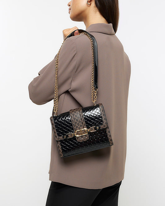 Black embossed RI monogram cross body bag